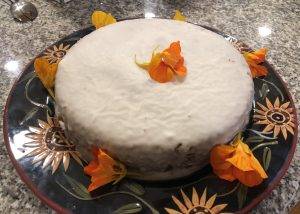 Cake with orange flowers on top