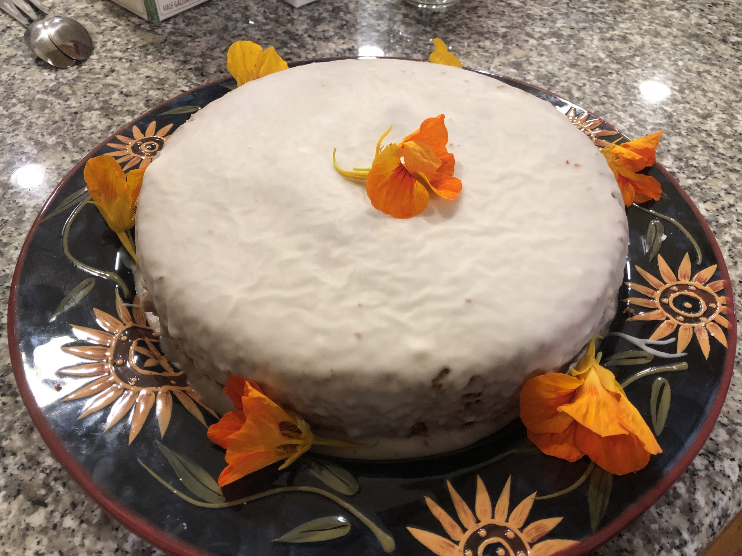 Cake with orange flowers on top