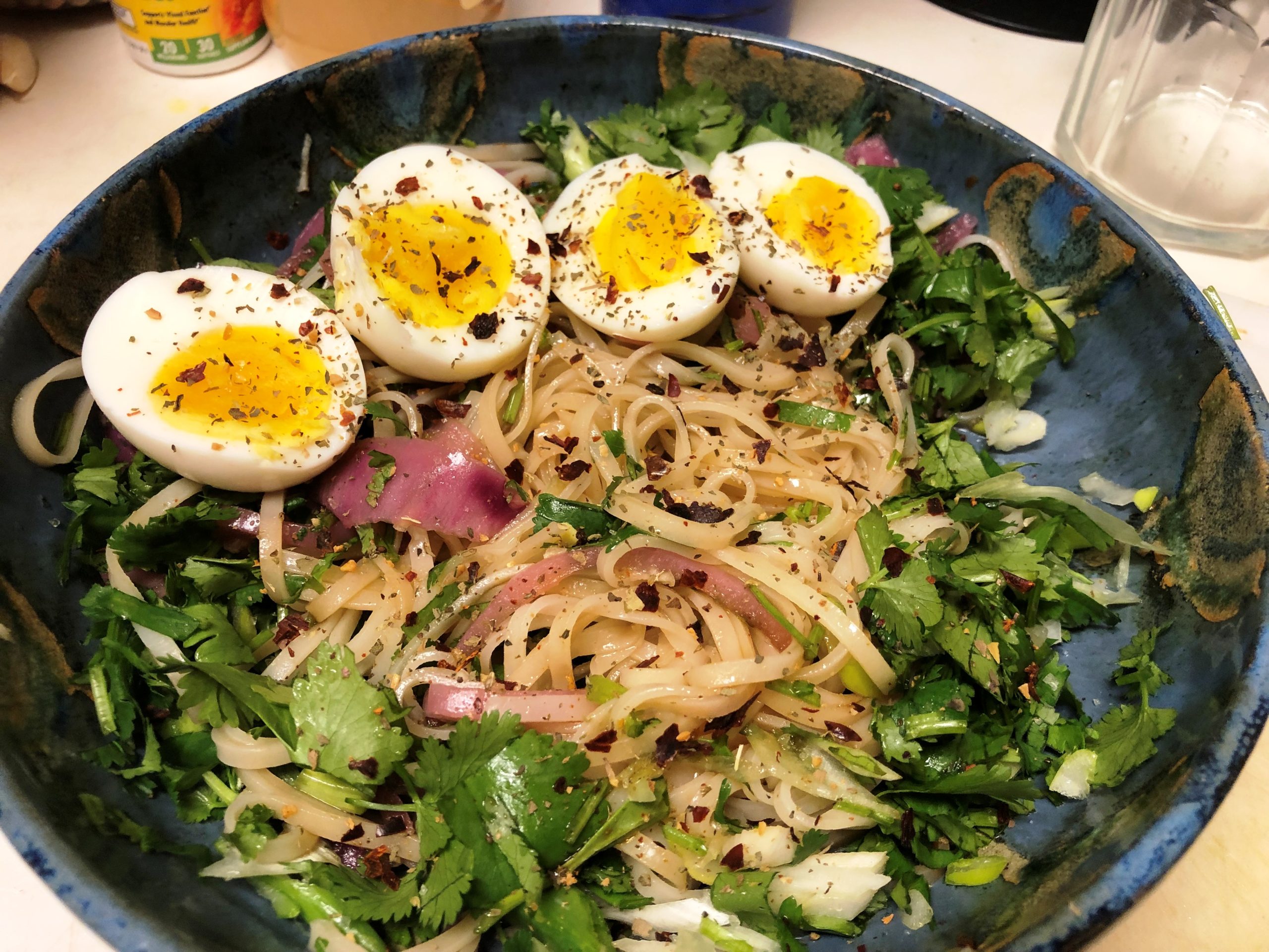 Pho with rice noodles and soft boiled eggs