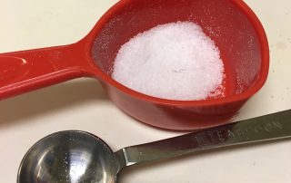 salt in measuring spoon